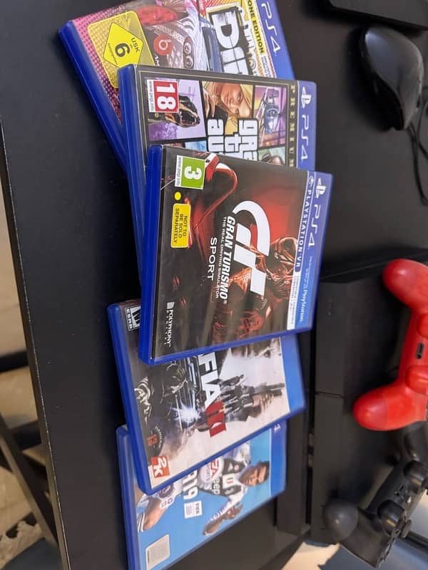 Ps4 with controllers and games 2