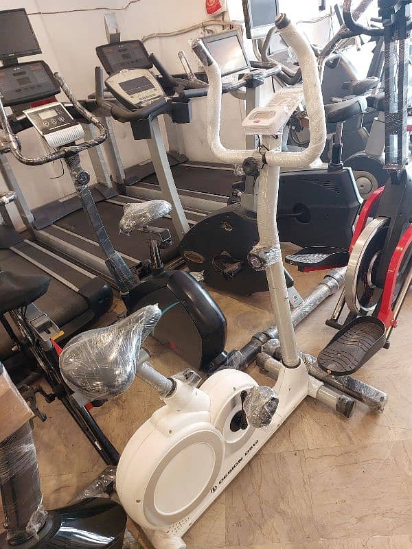 Home Gym / Elliptical / Spinning bike / Treadmill / dumbell / plates 7