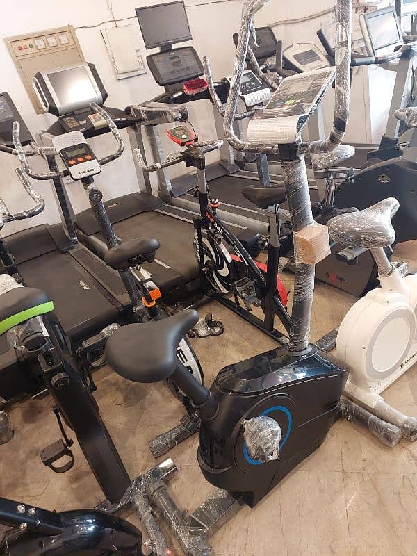 Home Gym / Elliptical / Spinning bike / Treadmill / dumbell / plates 8