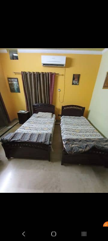 2 singel wooden  bed  with matres good condetion 0