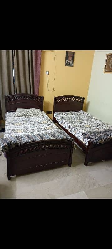 2 singel wooden  bed  with matres good condetion 1