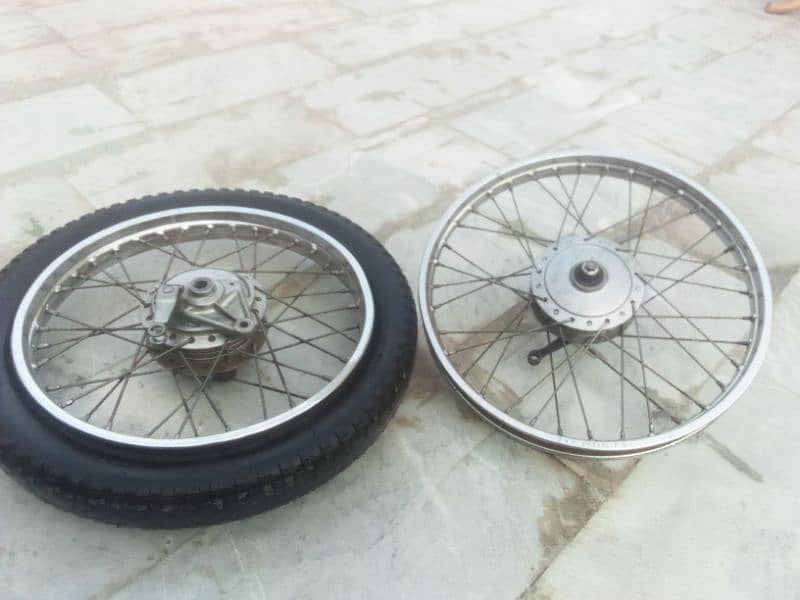 125 genuine 2 rims complet hub 0