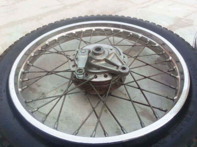 125 genuine 2 rims complet hub 1