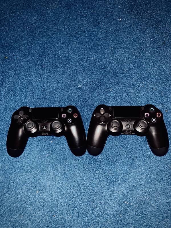 Sony, PS4 with games and controllers 2