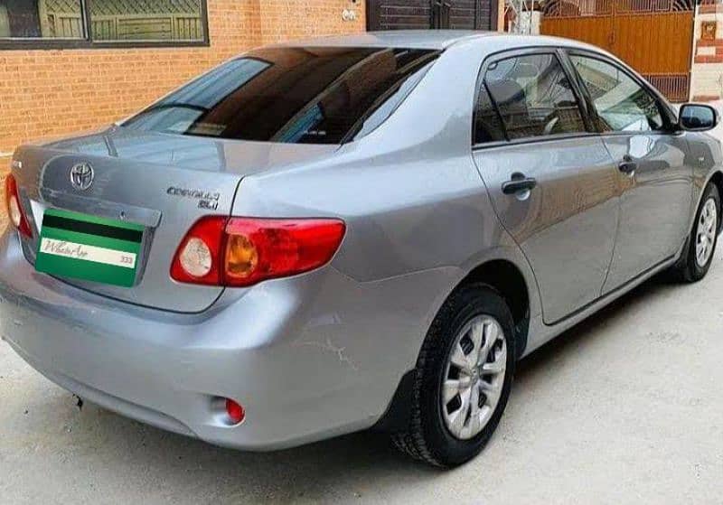 Toyota Corolla GLI 2009 body total original paint100%(Lahore register) 10