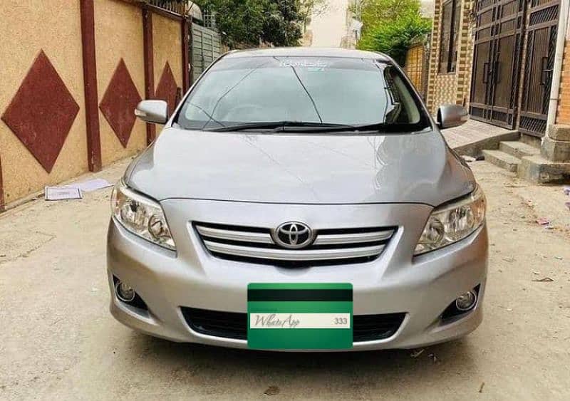 Toyota Corolla GLI 2009 body total original paint100%(Lahore register) 12