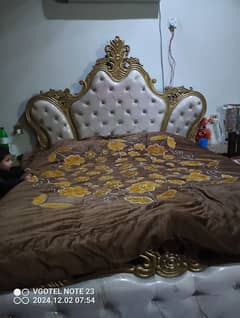 bed with mattress and side tables