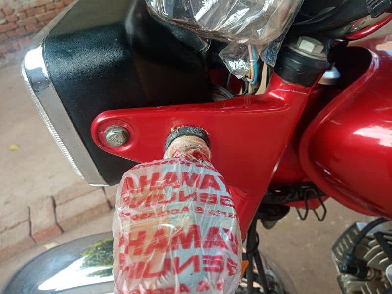 Yamaha 100cc 2 stroke bike for sale total original location Lahore DHA 2