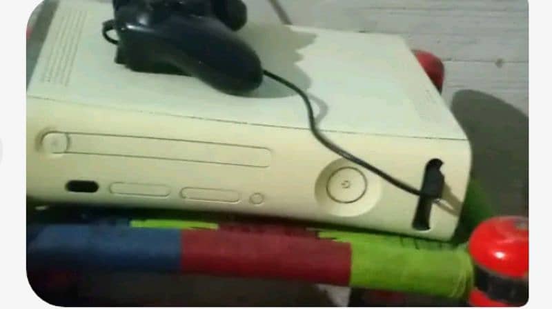 Xbox 360 with wireless controller. 36 games and free space 200gb 1