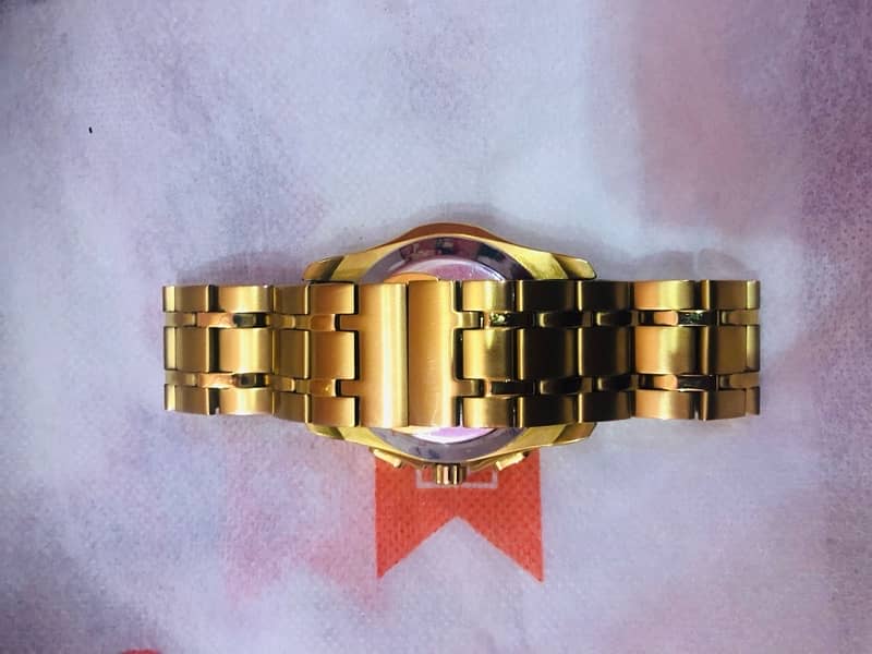 orignal al fajar golden colour watch  model (AL 219 ) 1