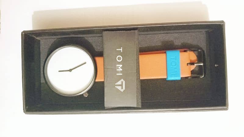 Tomi watch . . T078 1