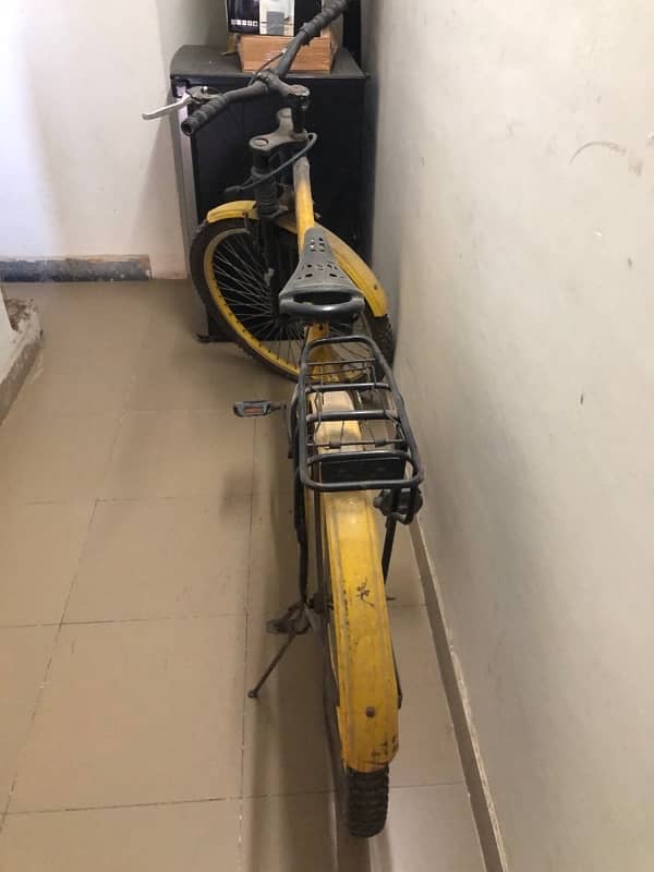 very beautiful bycycle in yellow clr sports type with shocks for sale 0