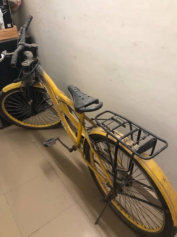 very beautiful bycycle in yellow clr sports type with shocks for sale 1