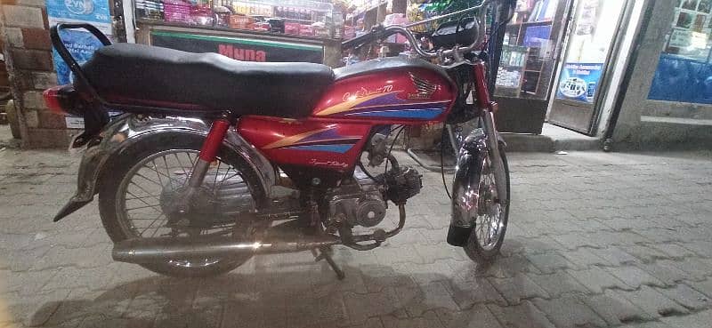 Honda 70 Rawalpindi number 2006 model. . . 03065228576 4