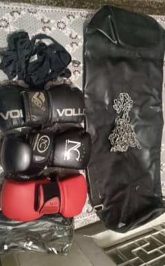 Essential Boxing Gear: Headgear, Sandbag, and Gloves