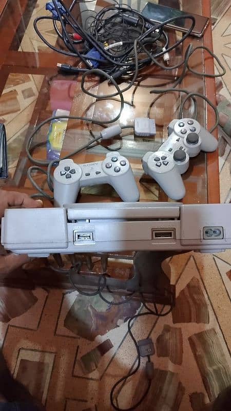 sony ps1 with 2 controller game new condition on condition me hai 6