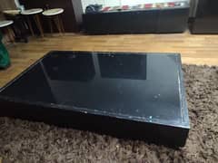 Black modern center table with glass