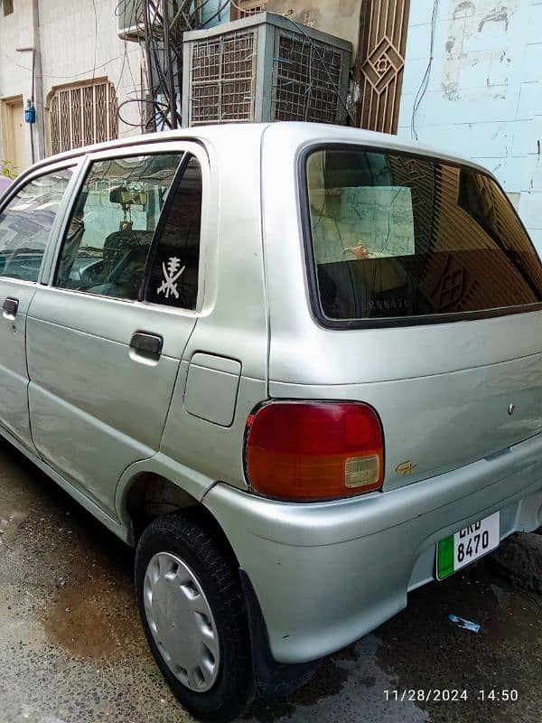 Daihatsu Cuore 2002 inside total original 6