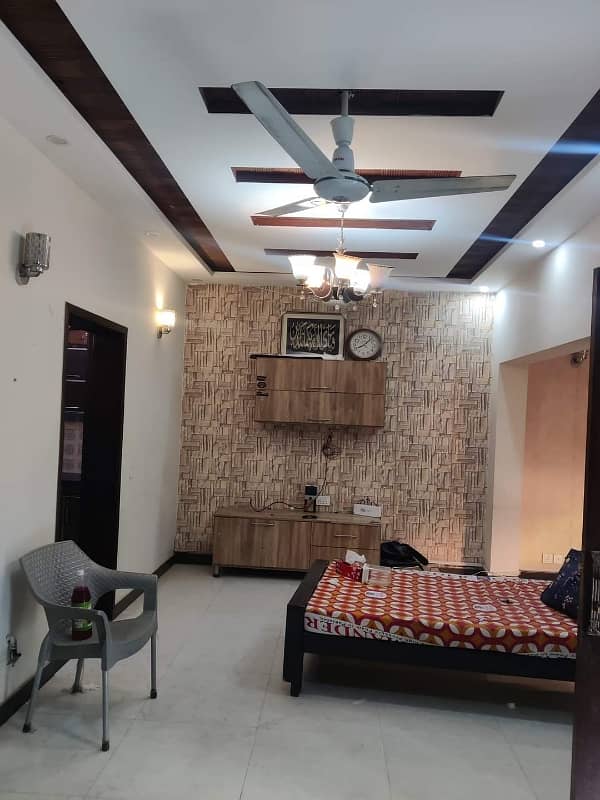 5 marla new tile floor 4bed triple story house in Tariq garden near wapda town 1