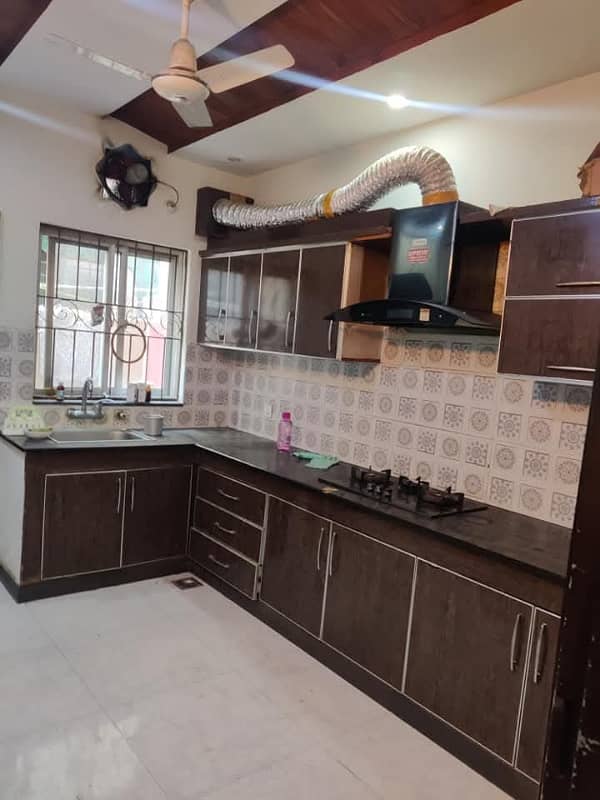 5 marla new tile floor 4bed triple story house in Tariq garden near wapda town 5