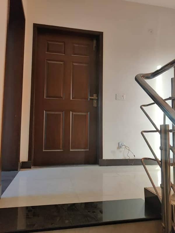 5 marla new tile floor 4bed triple story house in Tariq garden near wapda town 7