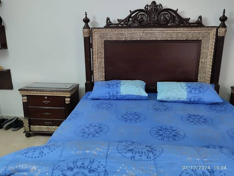 king size wooden bed with side tables and dressing table 1