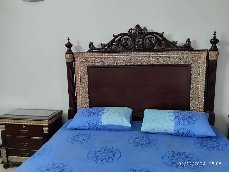 king size wooden bed with side tables and dressing table 4