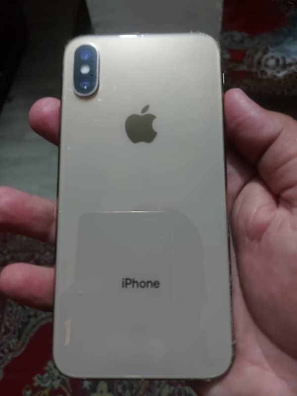 iPhone XS , 64 GB storage . Factory unlock 0