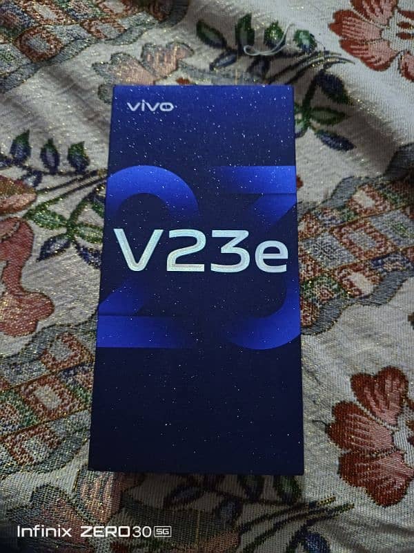 Vivo v23 e. 8gb 128 gb with box charger back pr Paper 1