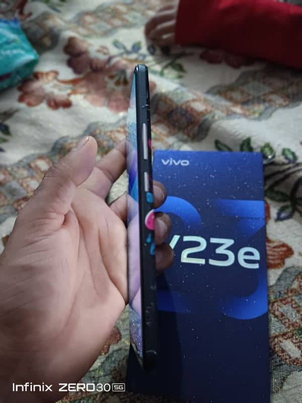 Vivo v23 e. 8gb 128 gb with box charger back pr Paper 4