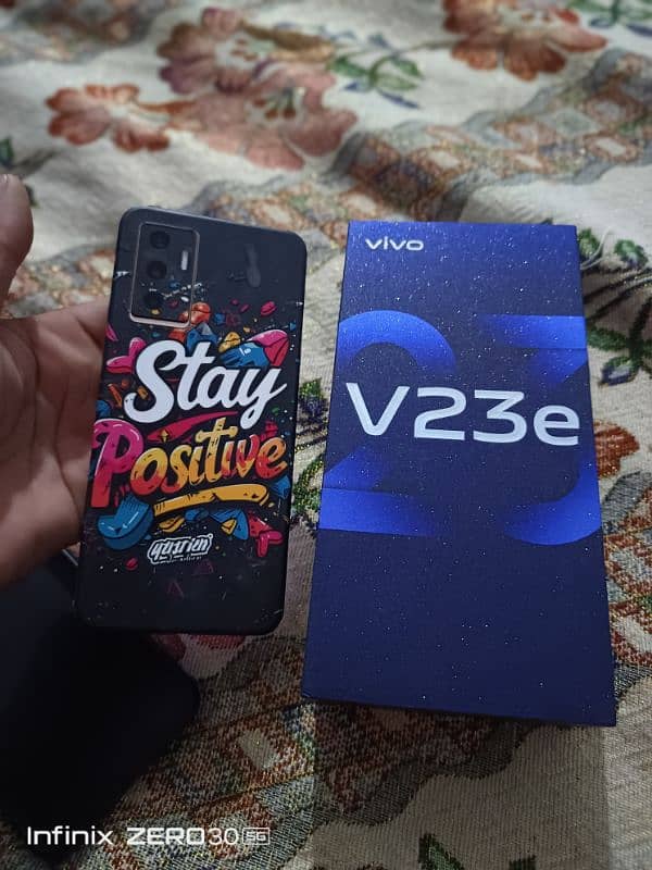 Vivo v23 e. 8gb 128 gb with box charger back pr Paper 6