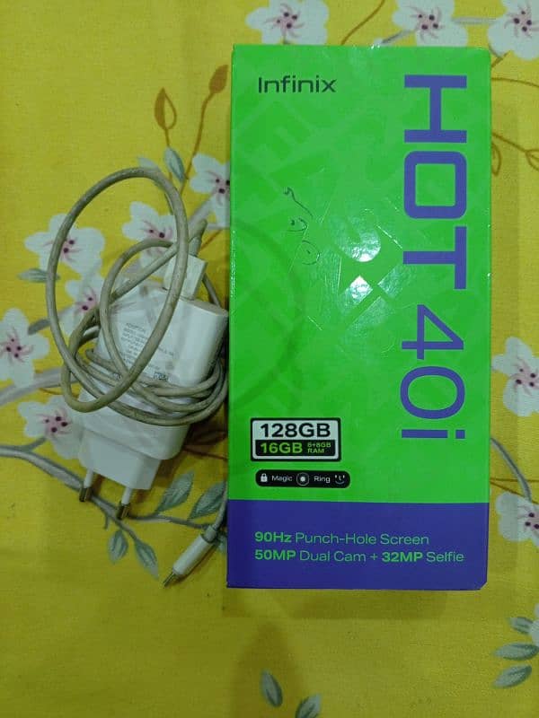 Infinix hot 40i mobile brand new condition in 6 months warranty 7