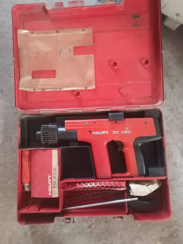 Hilti DX 450 drill machine and a used Table Fan 0