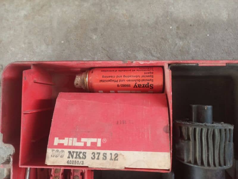 Hilti DX 450 drill machine and a used Table Fan 2