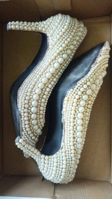 Hand work on heels with pearls 1