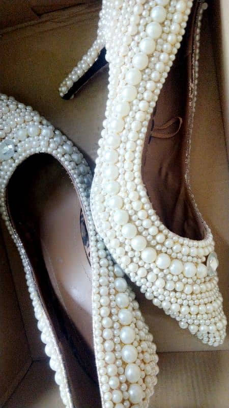 Hand work on heels with pearls 3