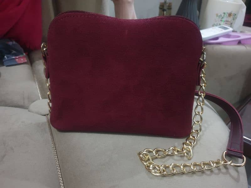 Maroon bag 0