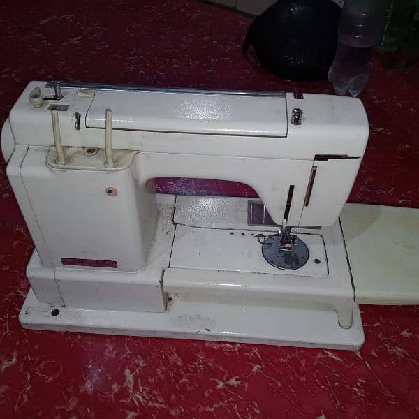 Janome Model 815 Rs. 16500/= 14