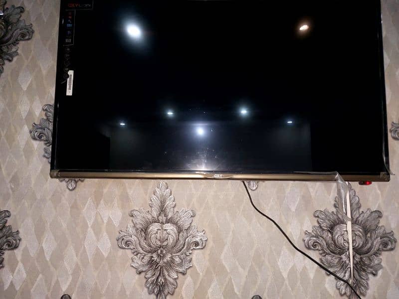 black sofa set, sethi, Qxy Led smart TV  and oven for sale 6