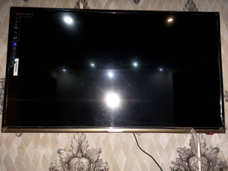 black sofa set, sethi, Qxy Led smart TV  and oven for sale 7