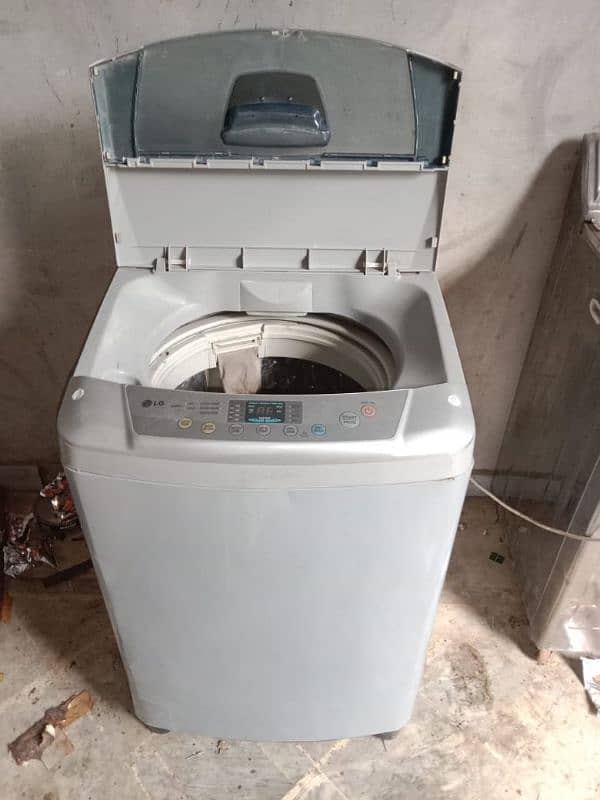 Lg 12Kg Fully automatic Washing machine 100% in working For Sale , 1