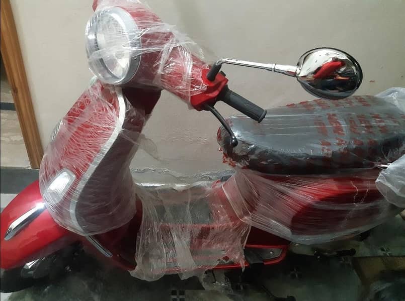 Ramza scooty red colour 1