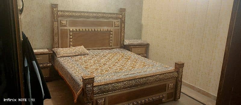 wooden bed with saitables dressing 0