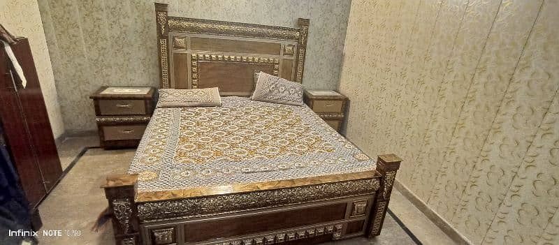 wooden bed with saitables dressing 11