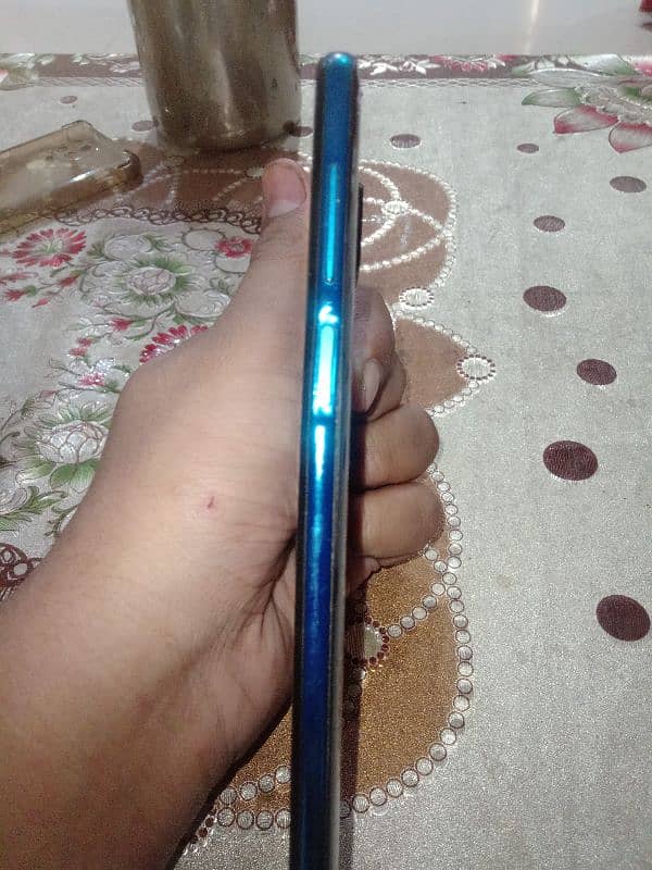 redmi not 9s 6/128 back brack ha Thore se baki all OK h 2