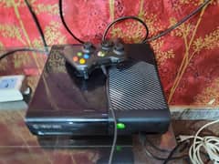 Xbox 360 e-slim non jail break with 2 controllers and two games