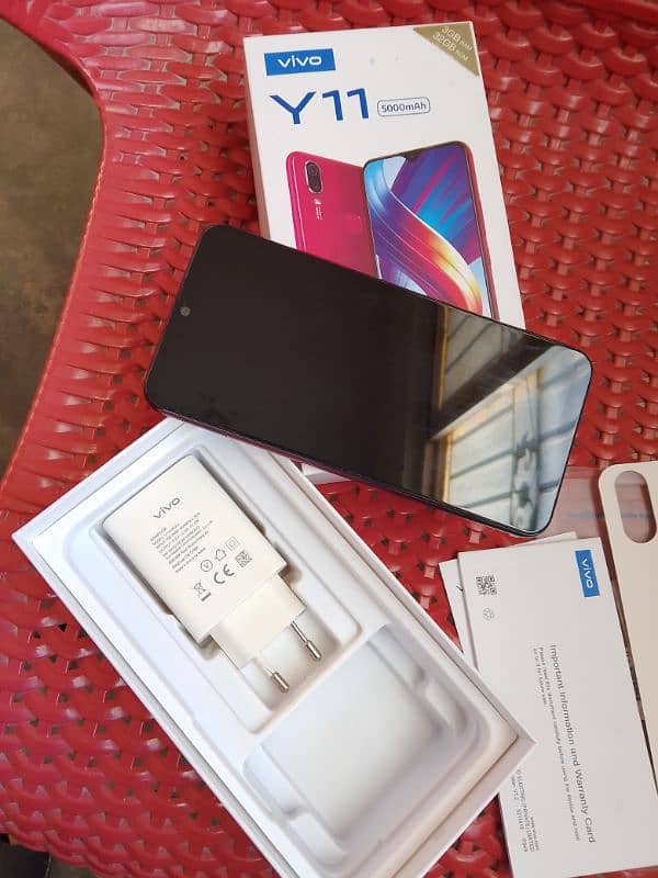 Vivo y11 Condition 10 by 10 3/32 Complete Box with charger cable. 1