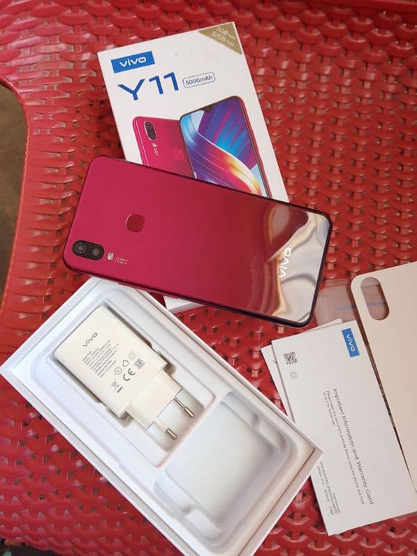 Vivo y11 Condition 10 by 10 3/32 Complete Box with charger cable. 2