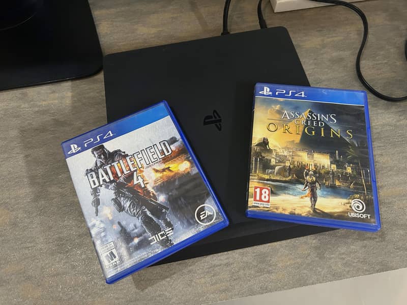 PS4 Slim 1TB | 10/10 condition | Imported from UK | Includes 2 games 0