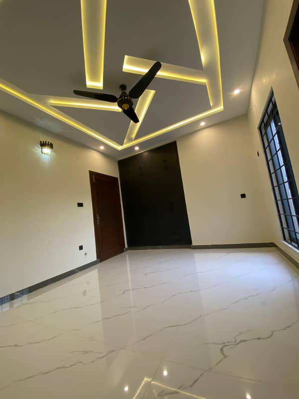 5 Marla Brand new fully designer house for sale in investor price in BAHRIA TOWN PHASE 8 RWP 17